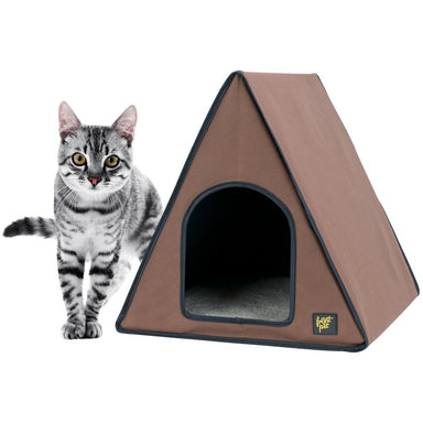 Front view of outdoor heated cat house with cat